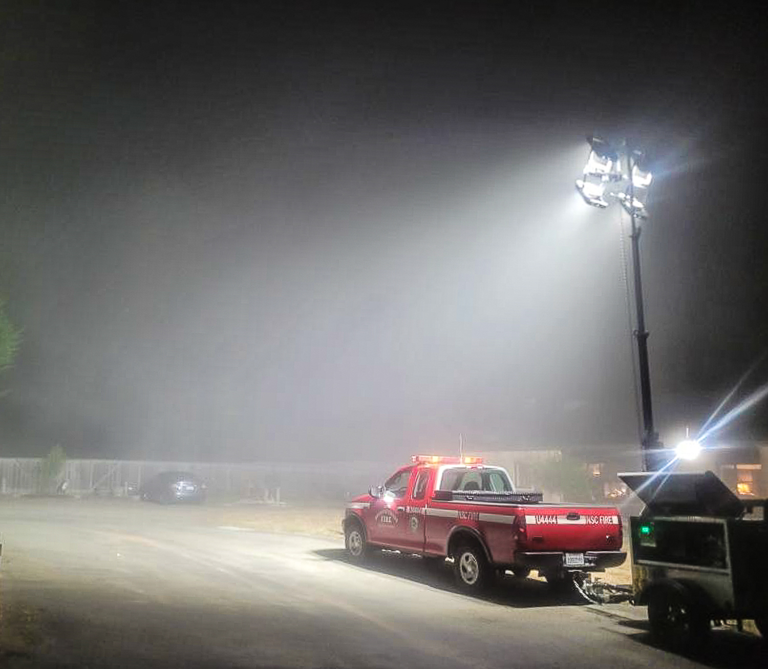 picture of generator 4438 at night with light tower lit