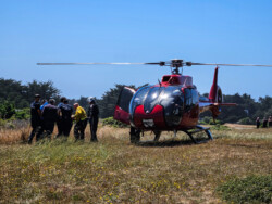REACH helo load behind sea ranch house