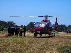 REACH helo load behind sea ranch house